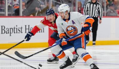 Dec 7, 2025; Sunrise, Florida, USA; New York Islanders defenseman Ryan Pulock (6) moves the puck against Florida Panthers center Carter Verhaeghe (23) during the third period at Amerant Bank Arena. Mandatory Credit: Sam Navarro-Imagn Images