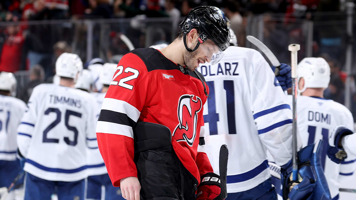 New Jersey Devils left wing Jesper Bratt (63) with center Nico Hischier (13): Gary A. Vasquez-Imagn Images