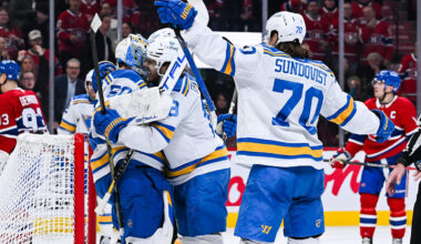 Dec 7, 2025; Montreal, Quebec, CAN; St. Louis Blues players jump on goalie Jordan Binnington (50) to celebrate the win against the Montreal Canadiens at Bell Centre. Mandatory Credit: David Kirouac-Imagn Images