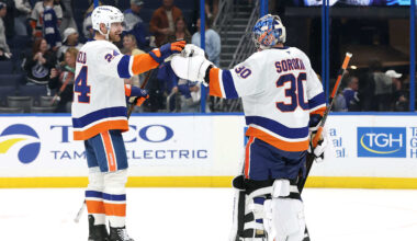 Dec 6, 2025; Tampa, Florida, USA;New York Islanders defenseman Scott Mayfield (24) and goaltender Ilya Sorokin (30) celebrate after they beat the Tampa Bay Lightning at Benchmark International Arena. Mandatory Credit: Kim Klement Neitzel-Imagn Images
