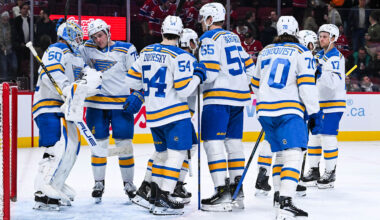 Dec 7, 2025; Montreal, Quebec, CAN; St. Louis Blues players gather together to celebrate their win against the Montreal Canadiens at Bell Centre. Mandatory Credit: David Kirouac-Imagn Images