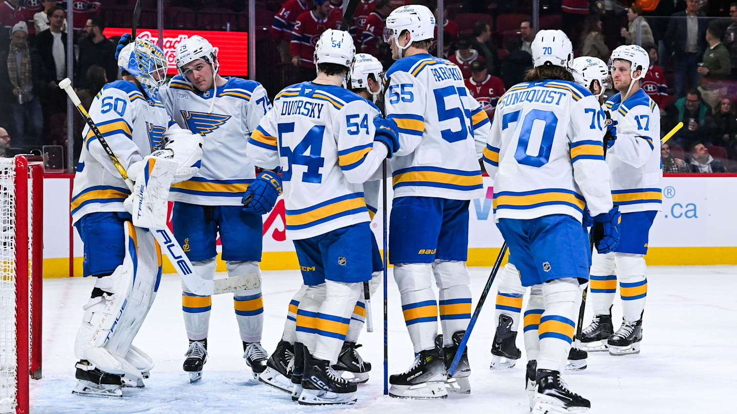 Dec 7, 2025; Montreal, Quebec, CAN; St. Louis Blues players gather together to celebrate their win against the Montreal Canadiens at Bell Centre. Mandatory Credit: David Kirouac-Imagn Images