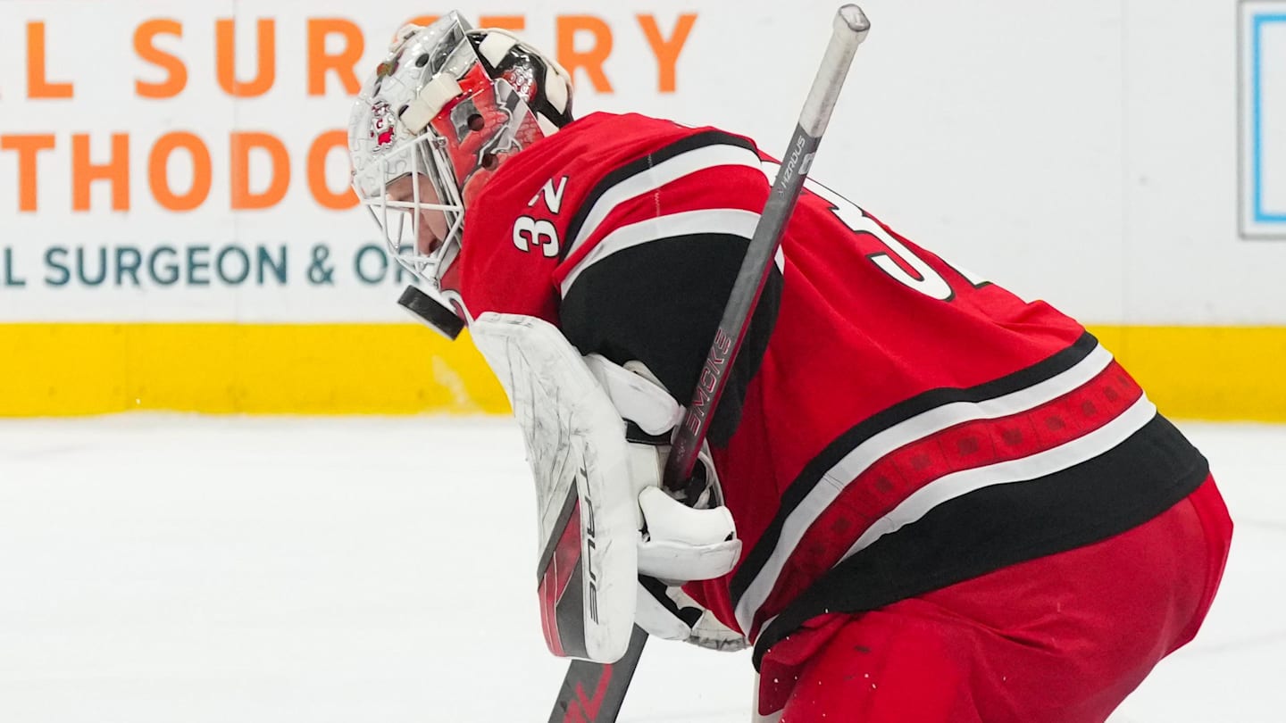 Dec 9, 2025; Raleigh, North Carolina, USA;  Carolina Hurricanes goaltender Brandon Bussi (32) makes a save against the Columbus Blue Jackets during the second period at Lenovo Center. Mandatory Credit: James Guillory-Imagn Images