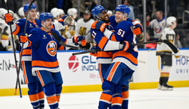Dec 9, 2025; Elmont, New York, USA; New York Islanders left wing Emil Heineman (51) celebrates his winning goal with New York Islanders left wing Anthony Duclair (11) after shootouts against the Vegas Golden Knights at UBS Arena. Mandatory Credit: Dennis Schneidler-Imagn Images