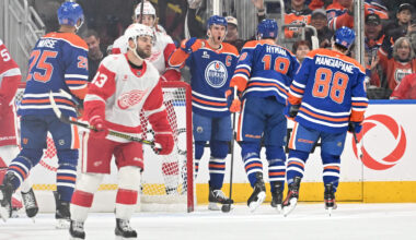 Dec 11, 2025; Edmonton, Alberta, CAN; Edmonton Oilers center Connor McDavid (97) and left winger Zach Hyman (18) celebrate a goal against Detroit Red Wings goalie Cam Talbot (39) during the second period at Rogers Place. Mandatory Credit: Walter Tychnowicz-Imagn Images