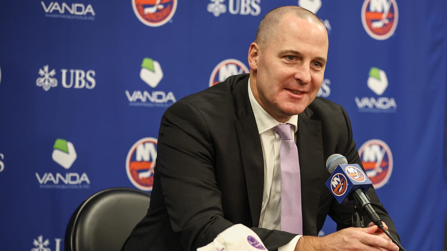 Nov 22, 2025; Elmont, New York, USA; New York Islanders General Manager Mathieu Darche speaks with fans at a pre-game event prior to the game against the St. Louis Blues at UBS Arena. Mandatory Credit: Wendell Cruz-Imagn Images