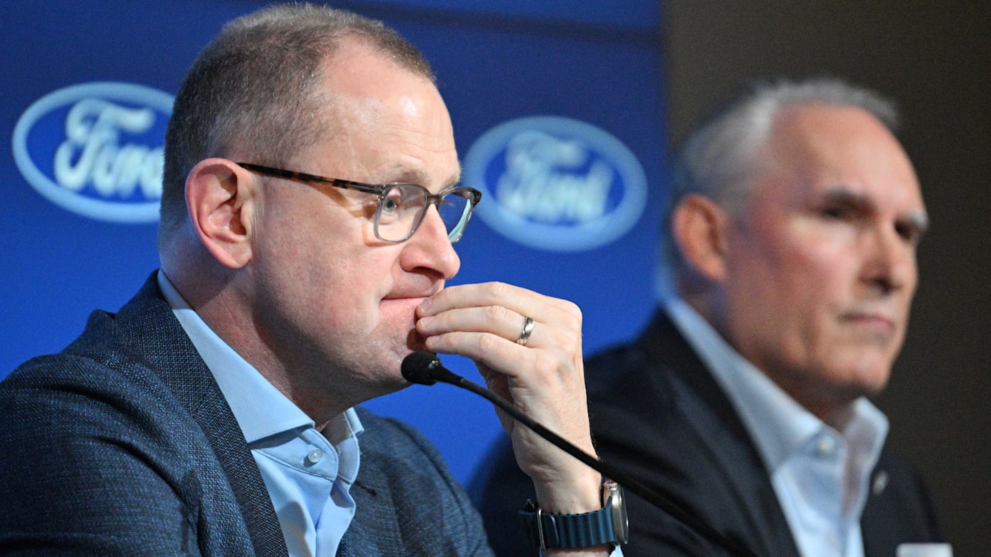 May 21, 2024; Toronto, Ontario, CANADA;  Toronto Maple Leafs general manager Brad Treliving listens to a question during a media conference to introduce new head coach Craig Berube (right) at Ford Performance Centre. Mandatory Credit: Dan Hamilton-Imagn Images