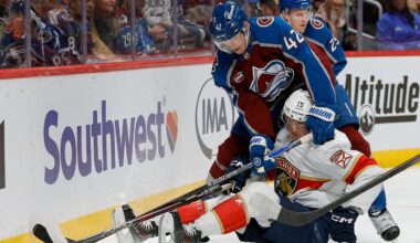 Dec 11, 2025; Denver, Colorado, USA; Florida Panthers center Anton Lundell (15) and Colorado Avalanche defenseman Josh Manson (42) battle for the puck in the first period at Ball Arena. Mandatory Credit: Isaiah J. Downing-Imagn Images