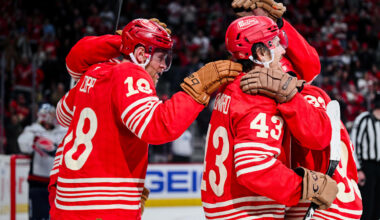 Dec 21, 2025; Detroit, Michigan, USA; Detroit Red Wings left wing John Leonard (43) celebrates with center Andrew Copp (18) and right wing Alex Debrincat (93) during the second period against the Washington Capitals at Little Caesars Arena. Mandatory Credit: Tim Fuller-Imagn Images