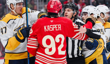 Nov 26, 2025; Detroit, Michigan, USA; Nashville Predators right wing Michael McCarron (47), right wing Ozzy Wiesblatt (89), and Detroit Red Wings center Marco Kasper (92) are broken up during the game at Little Caesars Arena.