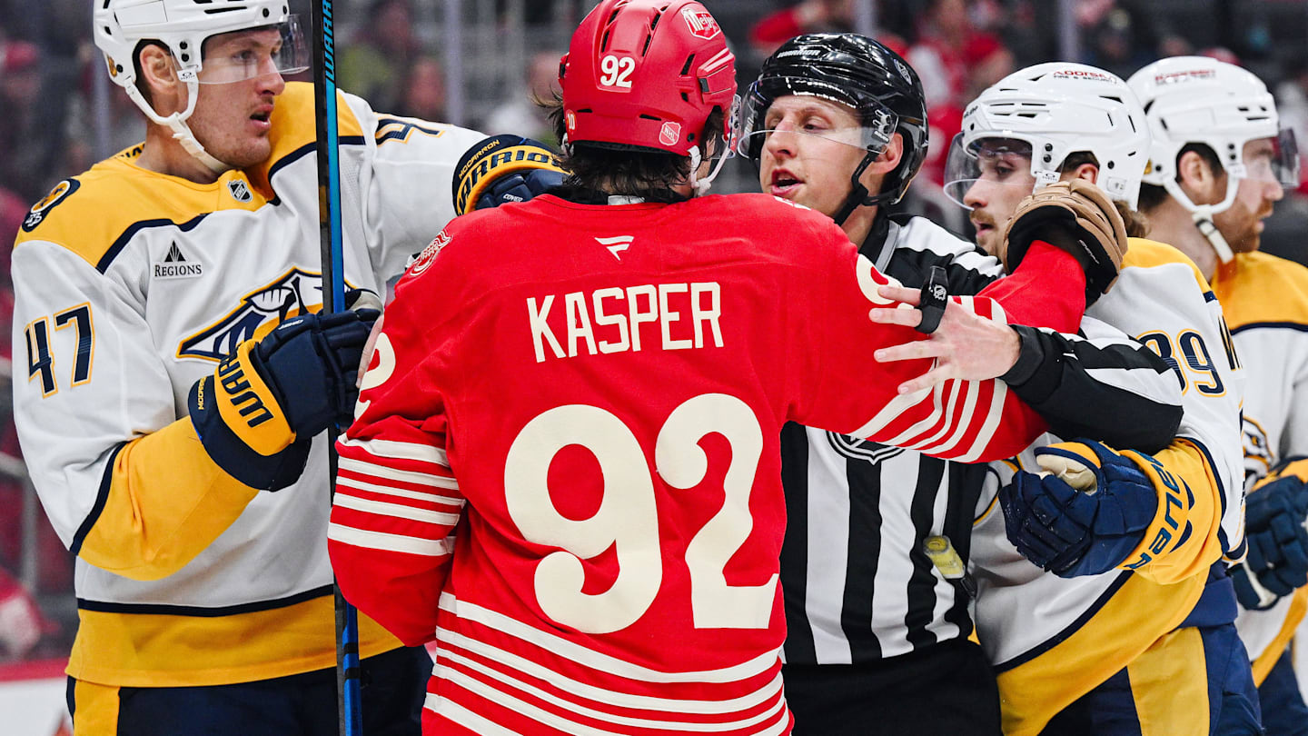 Nov 26, 2025; Detroit, Michigan, USA; Nashville Predators right wing Michael McCarron (47), right wing Ozzy Wiesblatt (89), and Detroit Red Wings center Marco Kasper (92) are broken up during the game at Little Caesars Arena.
