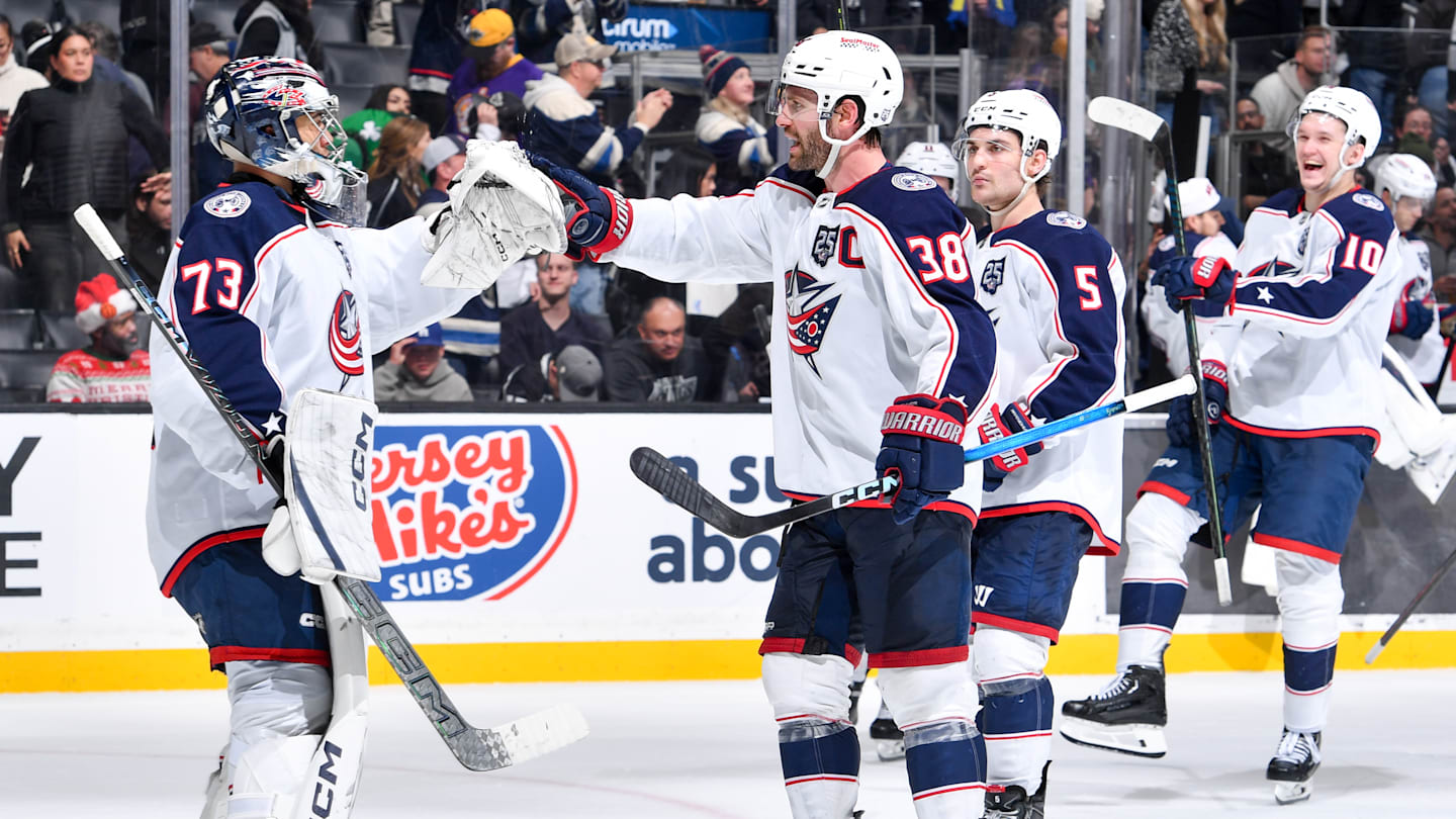 The Columbus Blue Jackets celebrate their win over the Los Angeles Kings on Monday night.