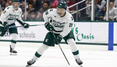 Blue Jackets prospect Cayden Lindstrom looks to make a play with the puck.