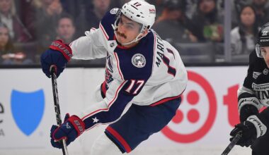 Dec 22, 2025; Los Angeles, California, USA; Columbus Blue Jackets left wing Mason Marchment (17) scores a goal ahead of Los Angeles Kings left wing Trevor Moore (12) during the first period at Crypto.com Arena. Mandatory Credit: Gary A. Vasquez-Imagn Images