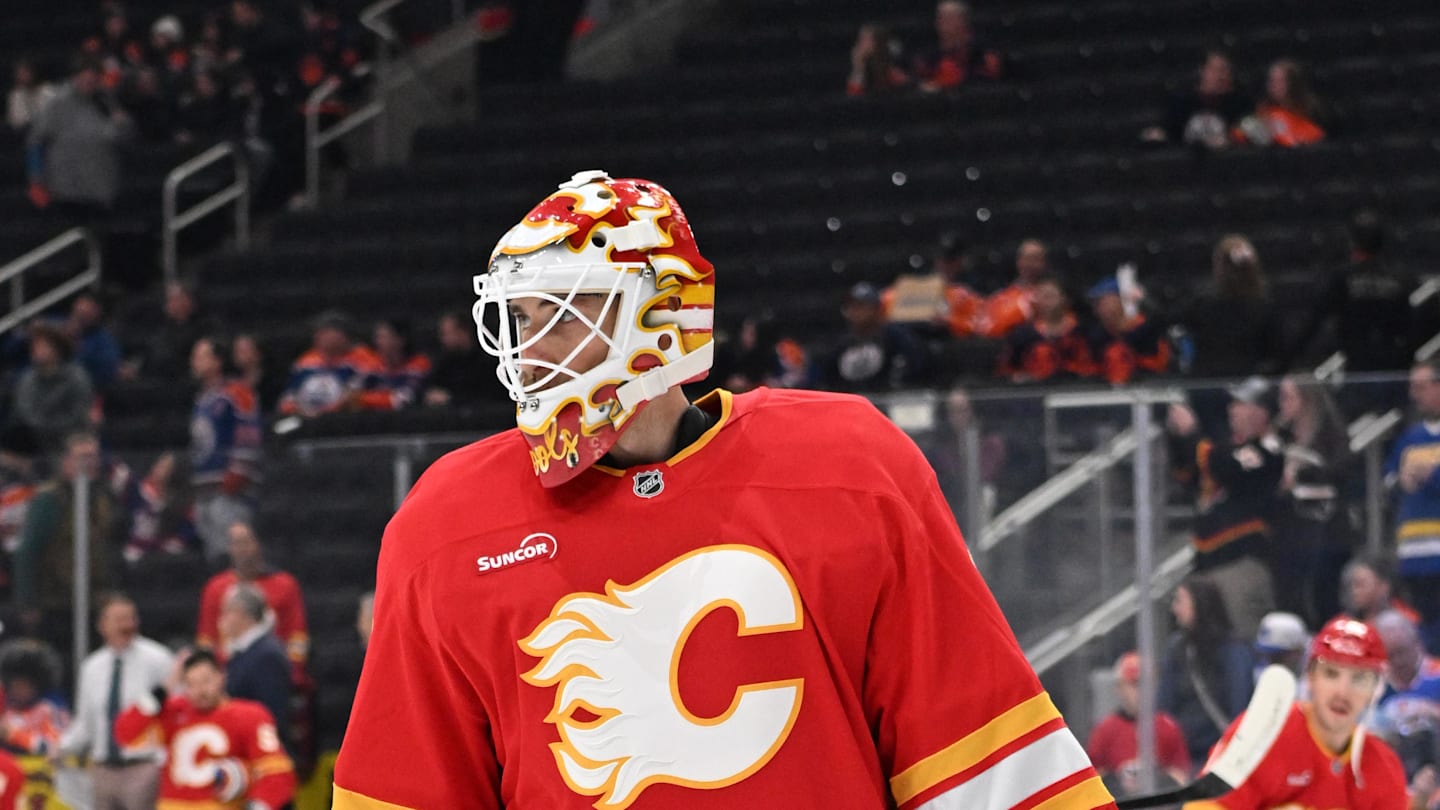 Dec 23, 2025; Edmonton, Alberta, CAN; Calgary Flames goalie Devin Cooley (1) is seen out on the ice during the pre game warm up as the Edmonton Oilers take on the Calgary Flames before the first period at Rogers Place. Mandatory Credit: Walter Tychnowicz-Imagn Images