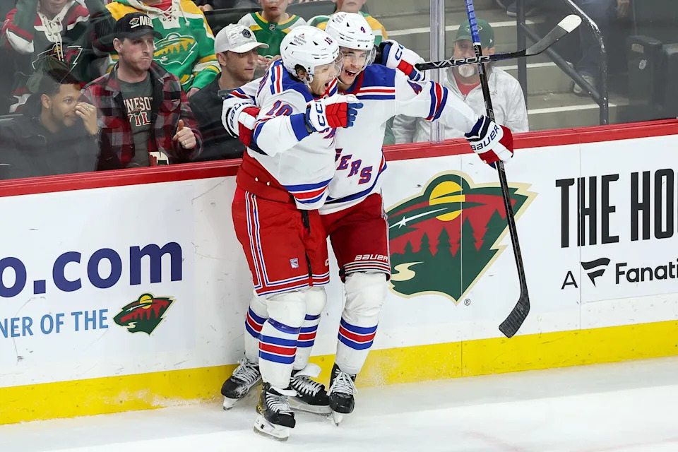 Mar 13, 2025; Saint Paul, Minnesota, USA; New York Rangers defenseman Braden Schneider (4) celebrates his game winning goal against the Minnesota Wild during overtime at Xcel Energy Center. Mandatory Credit: Matt Krohn-Imagn Images