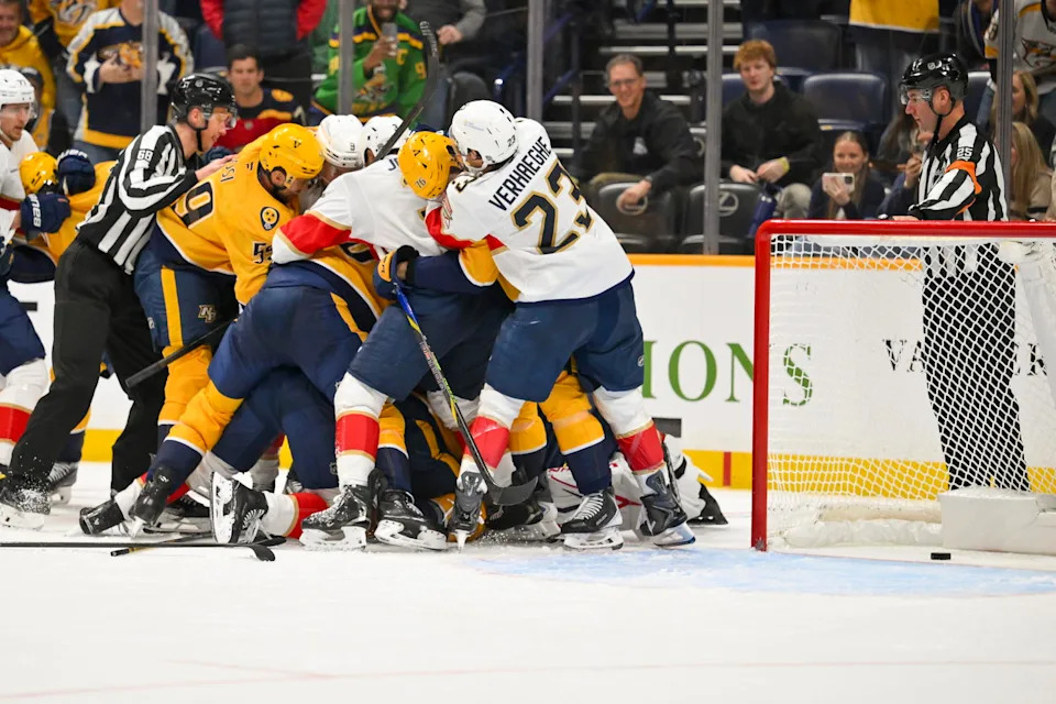 Nov 24, 2025; Nashville, Tennessee, USA; Florida Panthers and Nashville Predators both fight during the third period at Bridgestone Arena. Mandatory Credit: Steve Roberts-Imagn Images