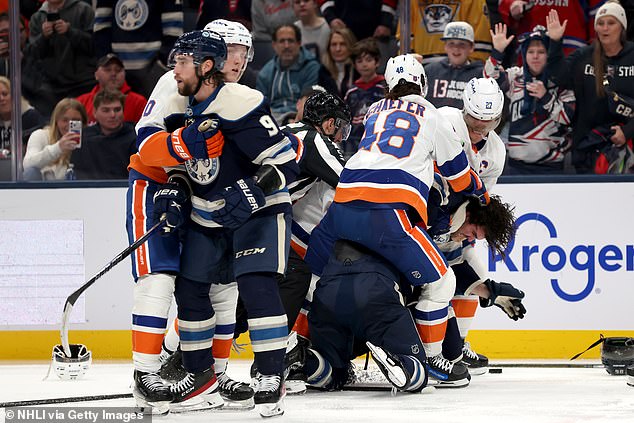 And when Mat Barzal hit Marchand with his stick, players from both teams fought back