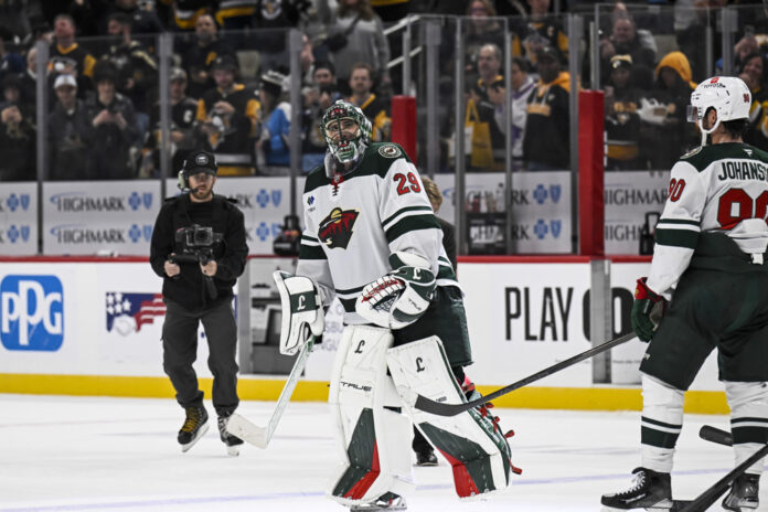 Minnesota Wild goaltender Marc-Andre Fleury acknowledges the crowd