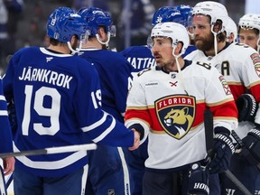 Florida Panthers winger Brad Marchand shakes hands with members of the Toronto Maple Leafs after Game 7 of their second-round playoff series.