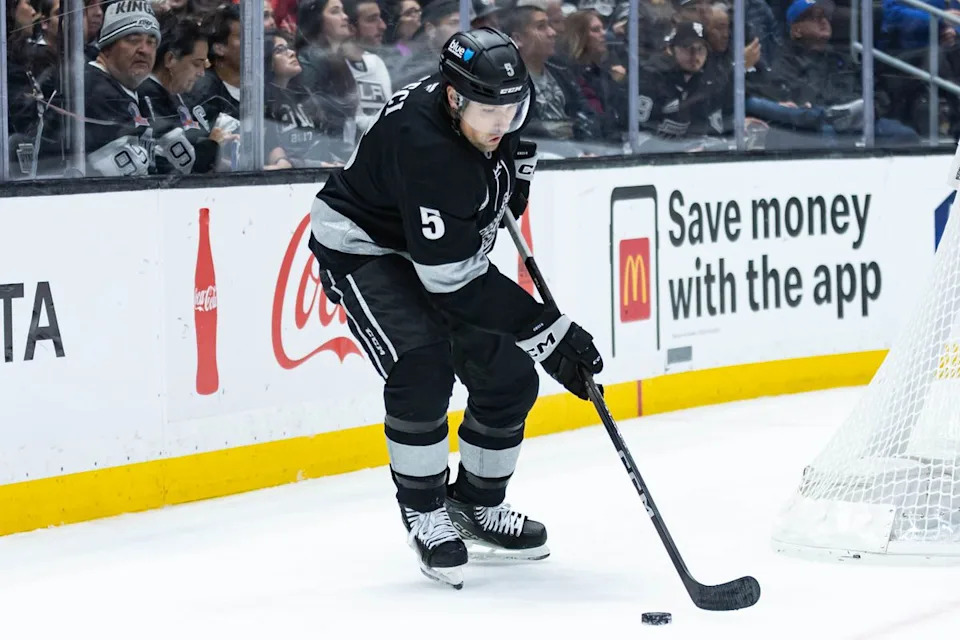 Los Angeles Kings defense Cody Ceci (5) clears the puck during an NHL game against the Chicago Blackhawks on December 6, 2025 in Los Angeles, Calif.