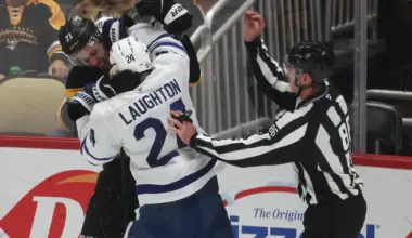 Leafs' Scott Laughton goes after Pens' Evgeni Malkin for attempting to clip him in the head