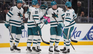 San Jose Sharks center Tyler Toffoli, second from right, celebrates his goal against the Seattle Kraken with teammates, including defenseman Timothy Liljegren (37), center Alexander Wennberg (21) and defenseman Shakir Mukhamadullin (85) during the third period of an NHL hockey game Wednesday, Nov. 5, 2025, in Seattle. (AP Photo/Lindsey Wasson)