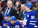 Maple Leafs head coach Craig Berube looks on from the bench with Bobby McMann (74), William Nylander (88) and John Tavares (91) during the second period against the St. Louis Blues in Toronto on Tuesday, Nov. 18, 2025.