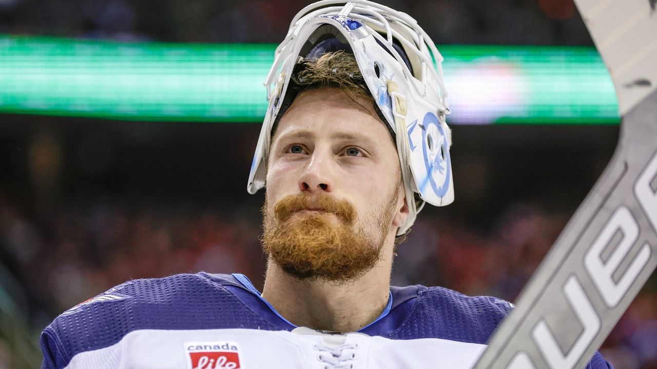 Blackhawks goaltender Laurent Brossoit assigned to minors for a conditioning assignment