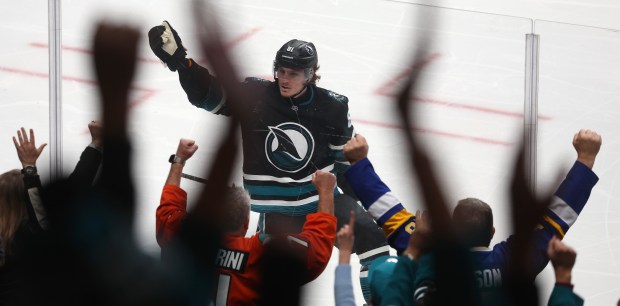 San Jose Sharks forward Adam Gaudette celebrates his second period...