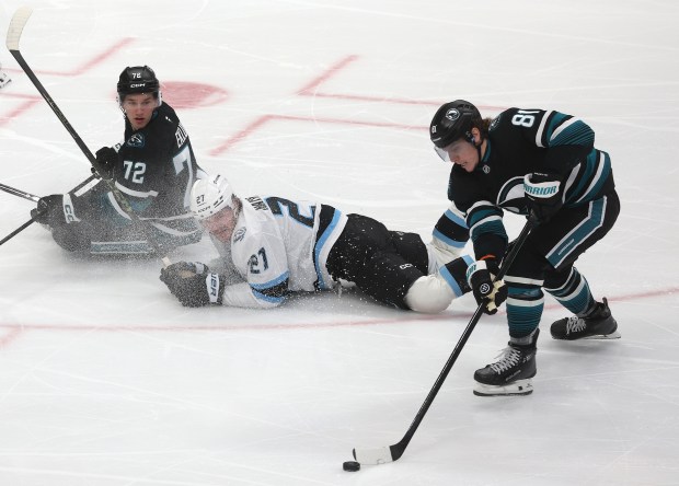 San Jose Sharks forward Adam Gaudette (81) scores a second...