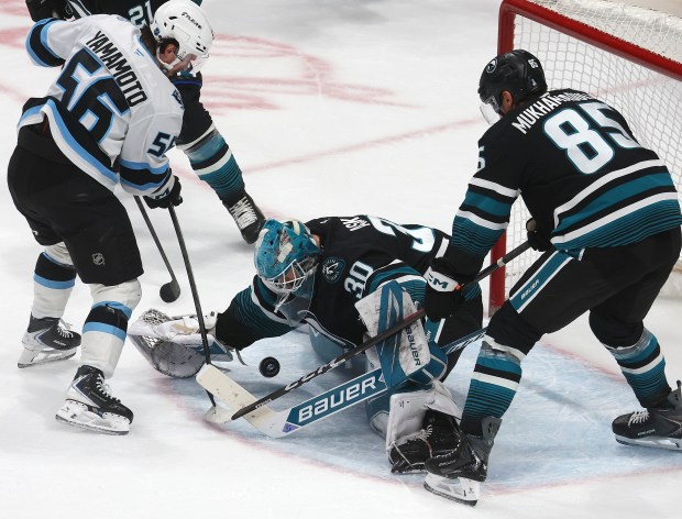 San Jose Sharks goaltender Yaroslav Askarov (30) makes a save...