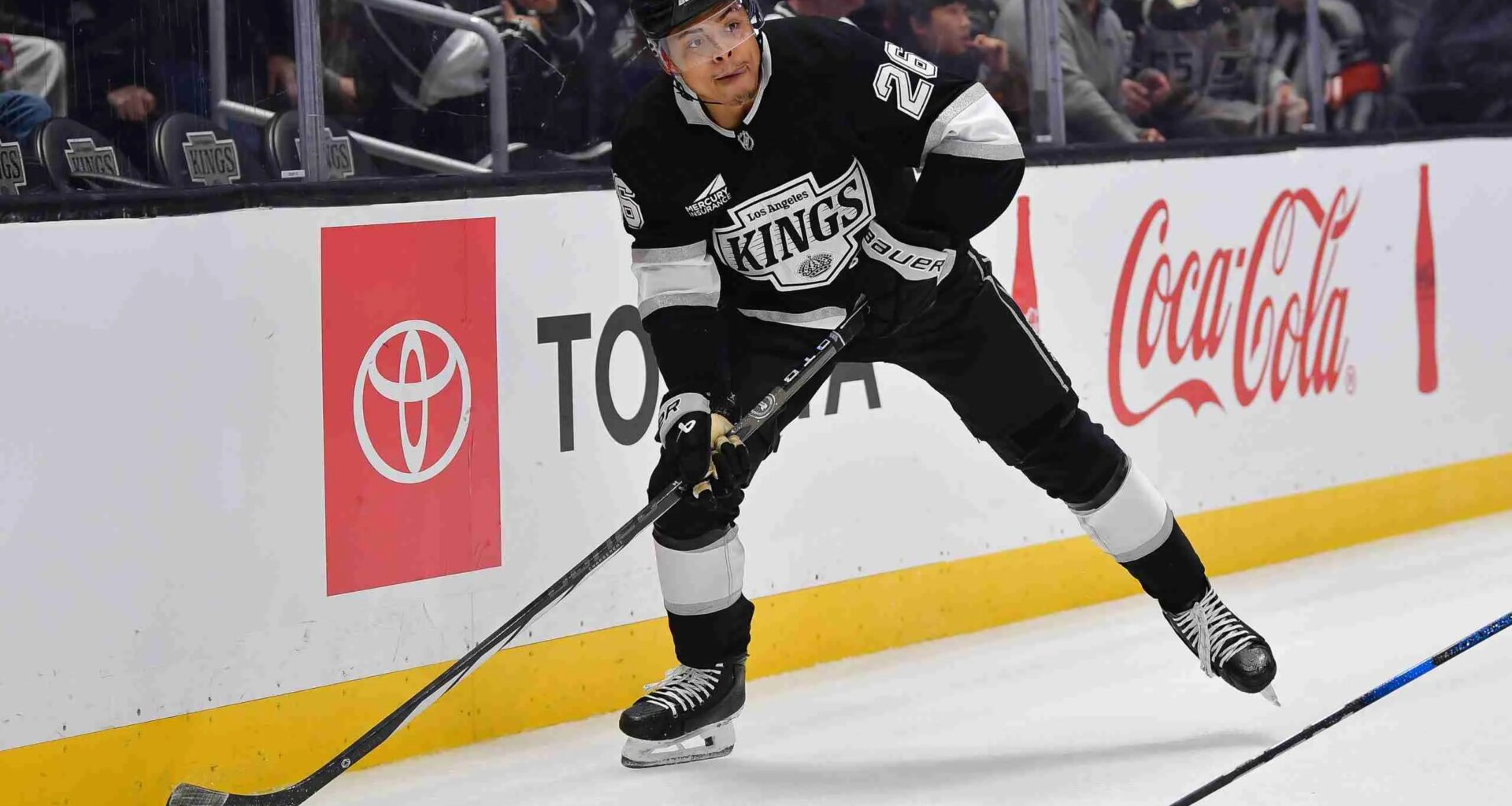 Kings' Holland trades Thomas, re-sings Helenius