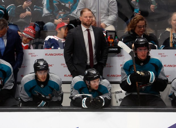 San Jose Sharks head coach Ryan Warsofsky keeps an eye on the game against the Washington Capitals in the second period at the SAP Center in San Jose, Calif., on Wednesday, Dec. 3, 2025. (Nhat V. Meyer/Bay Area News Group)