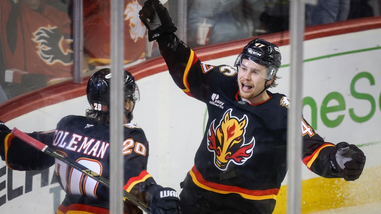 Dustin Wolf makes 26 saves, Flames slow surging Wild with 4-1 victory