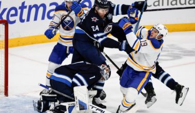 Eric Comrie makes 34 saves in Jets' 4-1 victory over the Sabres