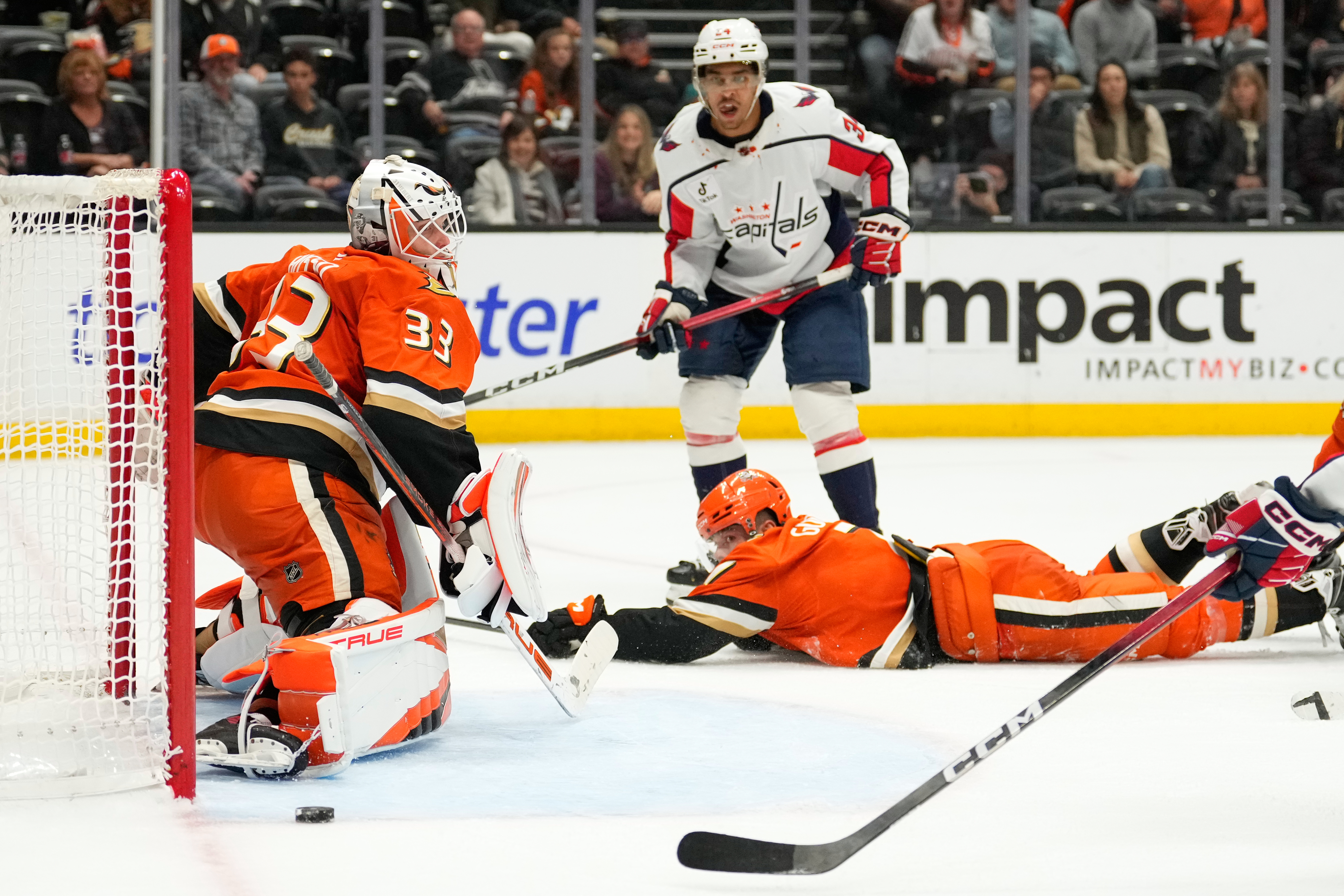 Ducks goaltender Ville Husso, deflects a shot as Washington Capitals...