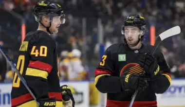 Tense moment between Quinn Hughes and Elias Pettersson caught live on broadcast