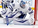 Toronto Maple Leafs goaltender Joseph Woll (60) watches the puck against the Carolina Hurricanes during the second period of an NHL hockey game in Raleigh, N.C., Thursday, Dec. 4, 2025.