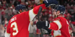 Seth Jones and Sam Bennett celebrate.