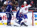 Canadiens forward Juraj Slafkovsky, right, celebrates a goal in the second period against the Maple Leafs at Scotiabank Arena in Toronto, Saturday, Dec. 6, 2025.