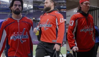 Washington Commanders players wear Capitals jerseys before Minnesota Vikings game