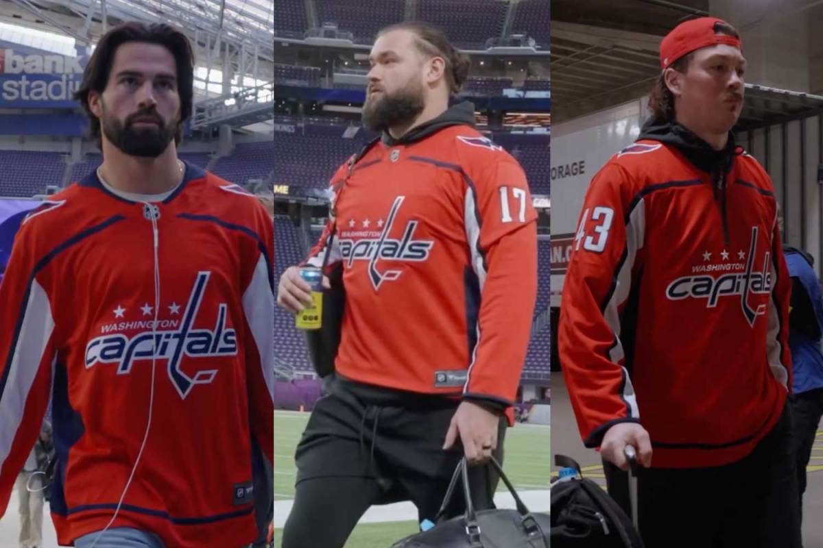 Washington Commanders players wear Capitals jerseys before Minnesota Vikings game