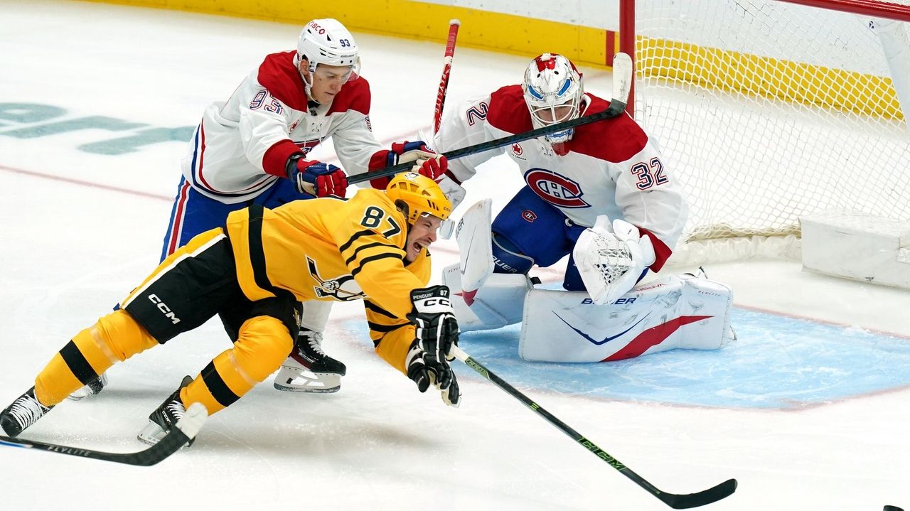 Fowler makes 33 saves in NHL debut as Canadiens beat Penguins 4-2
