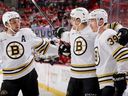 Morgan Geekie of the Boston Bruins celebrates with teammates after a goal against the Florida Panthers in Game 5 at Amerant Bank Arena on May 14, 2024 in Sunrise, Florida.