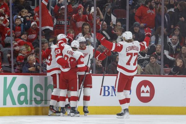 Alex DeBrincat’s 2 goals back G John Gibson as Red Wings blank Blackhawks