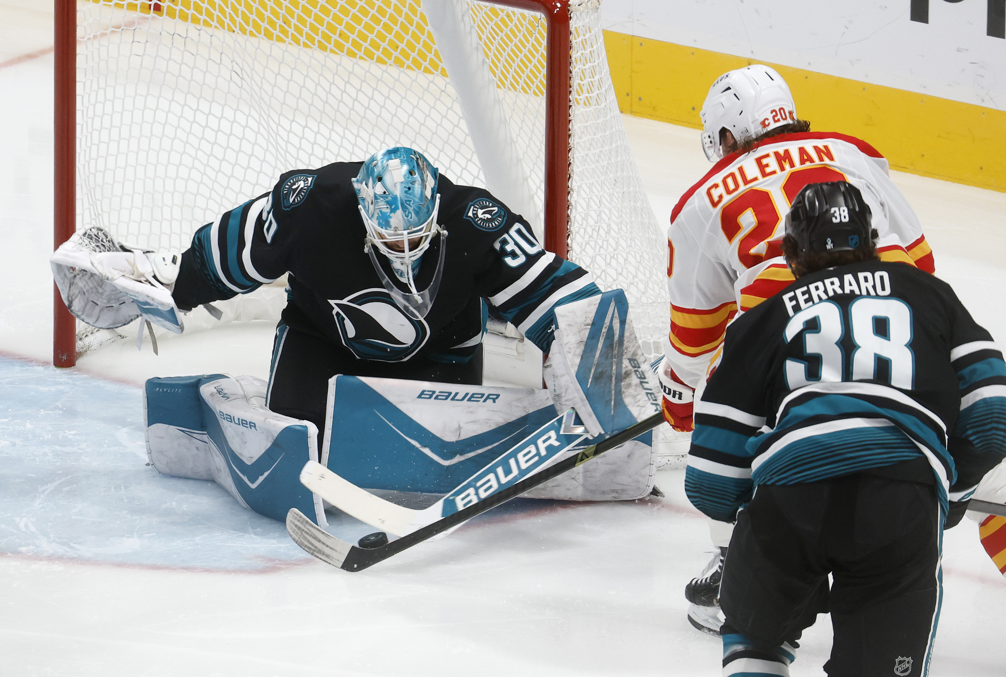 San Jose Sharks goaltender Yaroslav Askarov (30) blocks a shot...