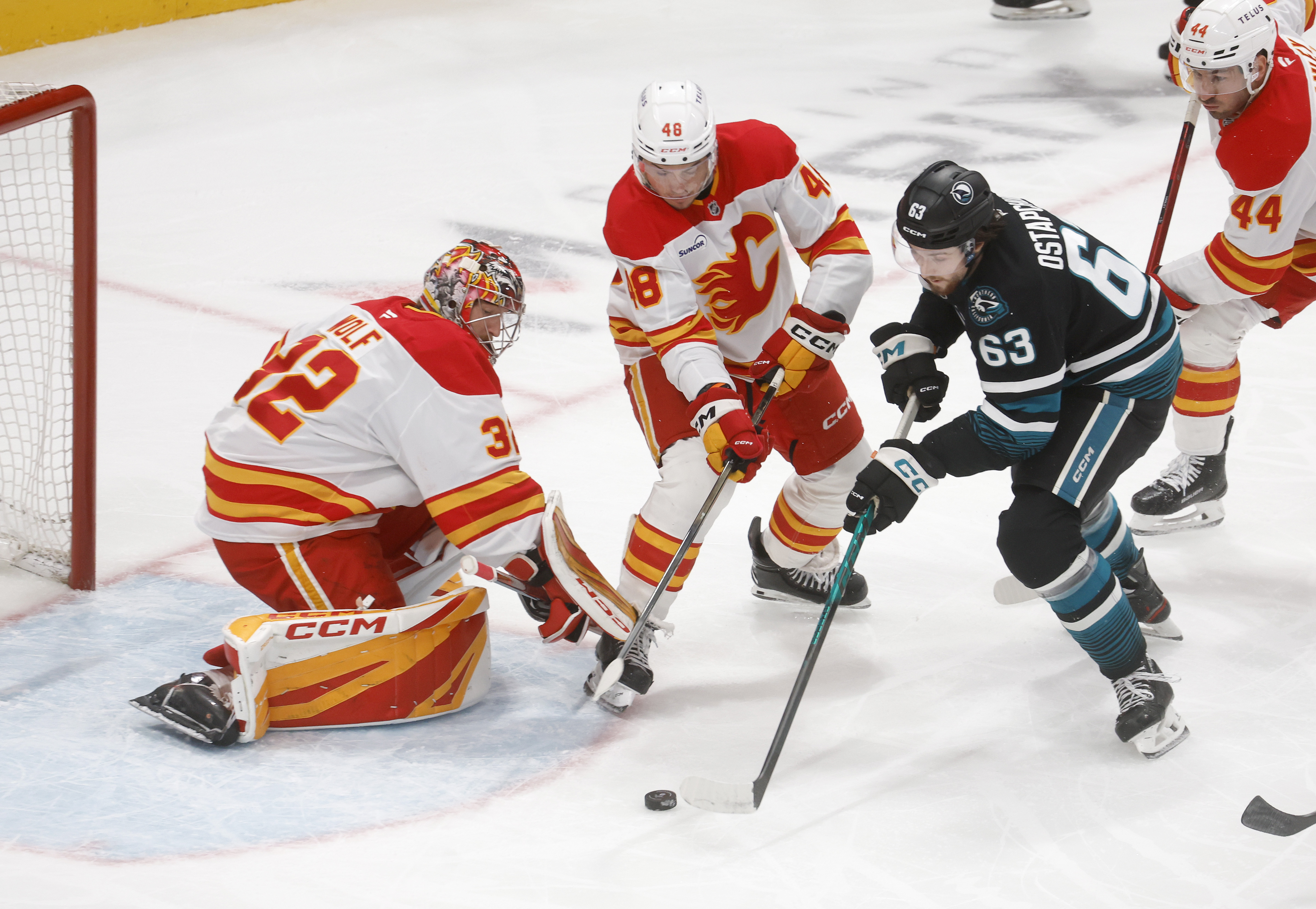 San Jose Sharks' Zack Ostapchuk (63) canât get a shot...