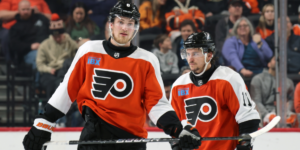 Travis Sanheim and Travis Konecny skating for the Philadelphia Flyers