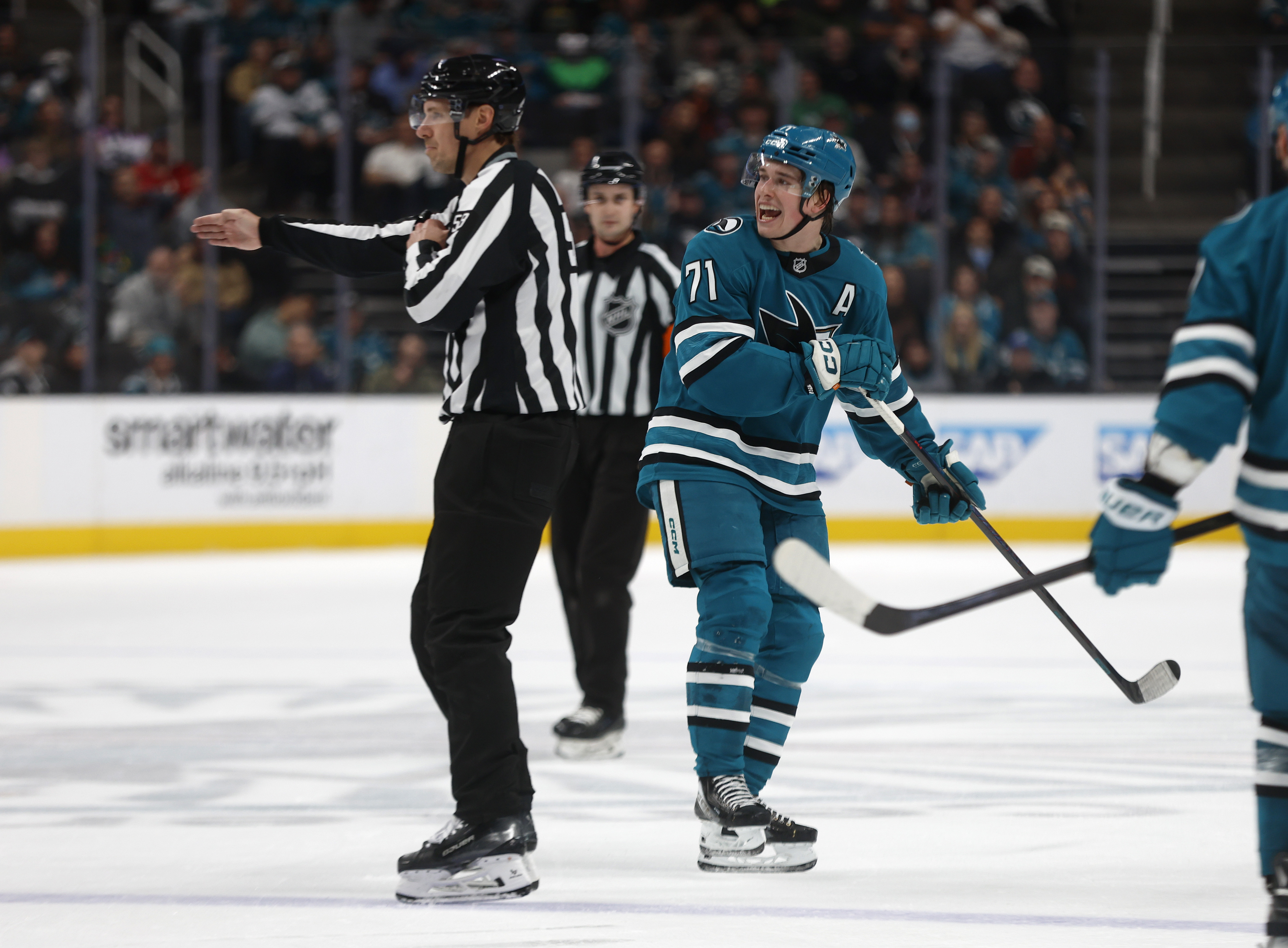 San Jose Sharks' Macklin Celebrini (71) yells at a referee...
